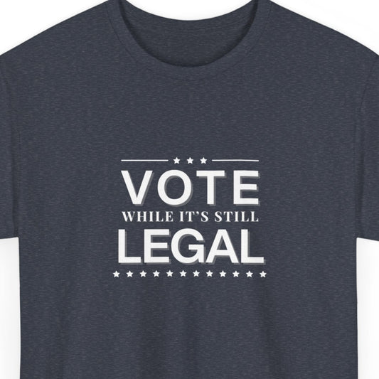Navy blue t-shirt with 'VOTE WHILE IT'S STILL LEGAL' text on a white background